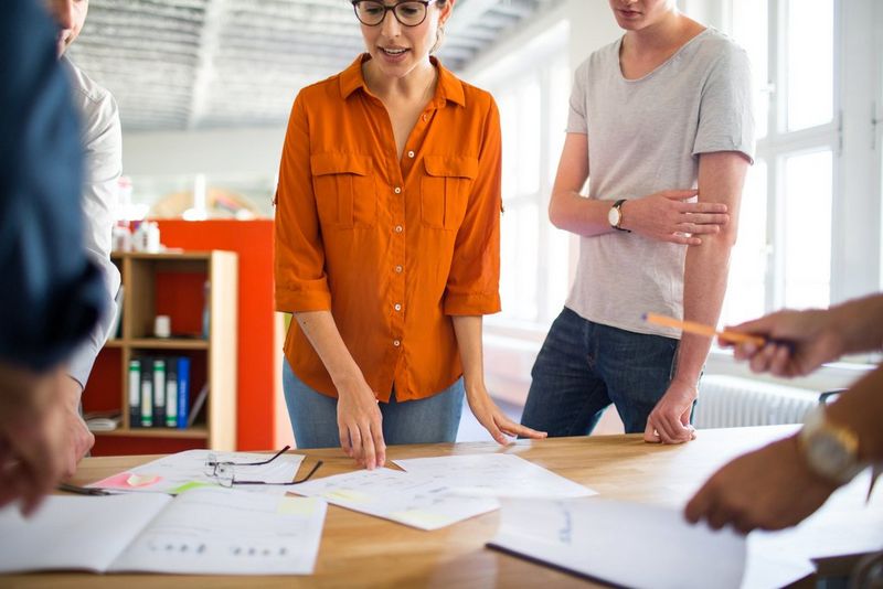 Female helicopter pilot_at work selecting tools_medium close up_business